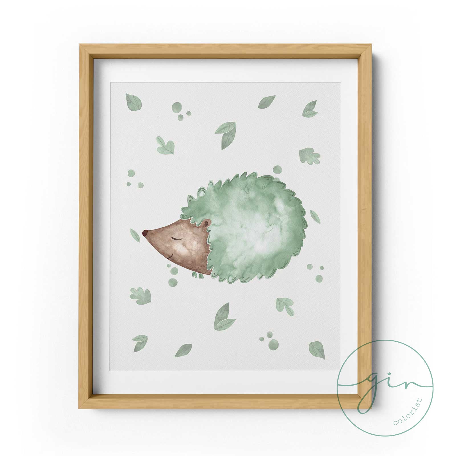 Gin Colorist personalised woodland prints in sage green displayed in wooden frames